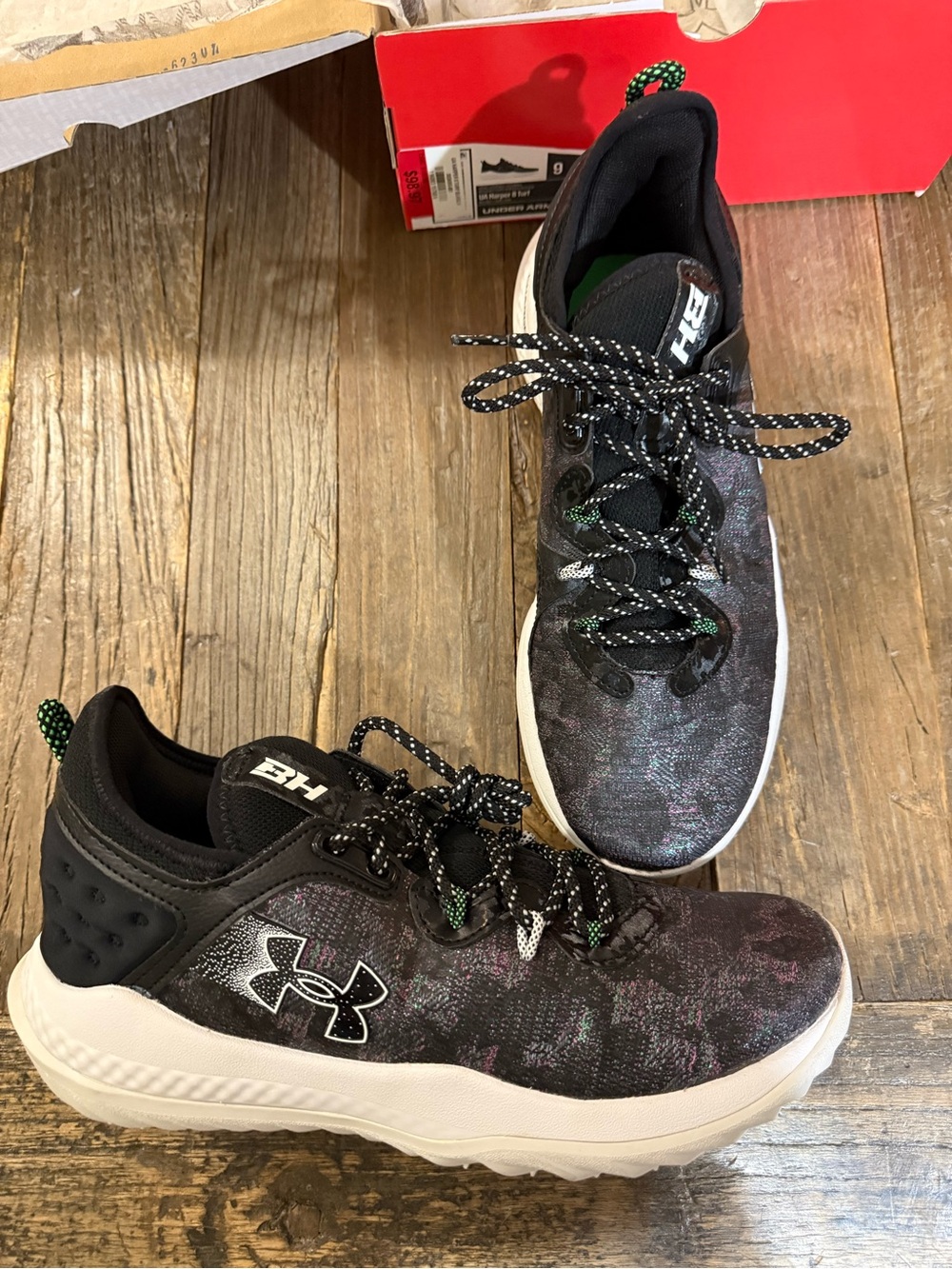 Under Armour Men’s Black Turf Baseball shoes with Subtle Iridescent Accents